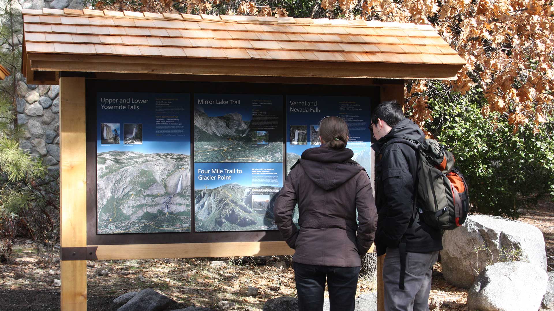 Interpretive signs on display in front of the Yosemite Valley Visitor Center
