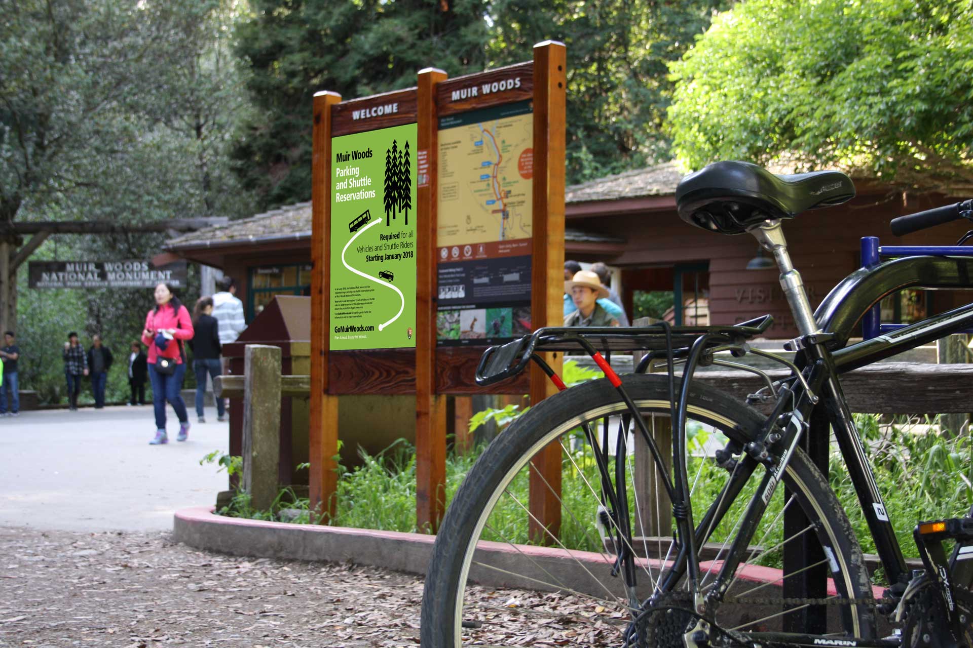 Parking and Shuttle Reservation sign at entry to Muir Woods